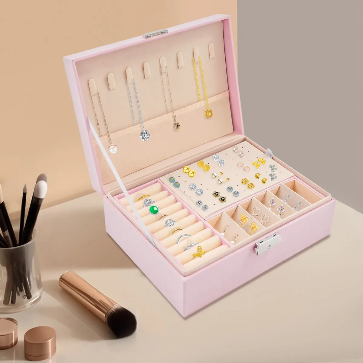 Boîte à bijoux rose à deux niveaux avec serrure